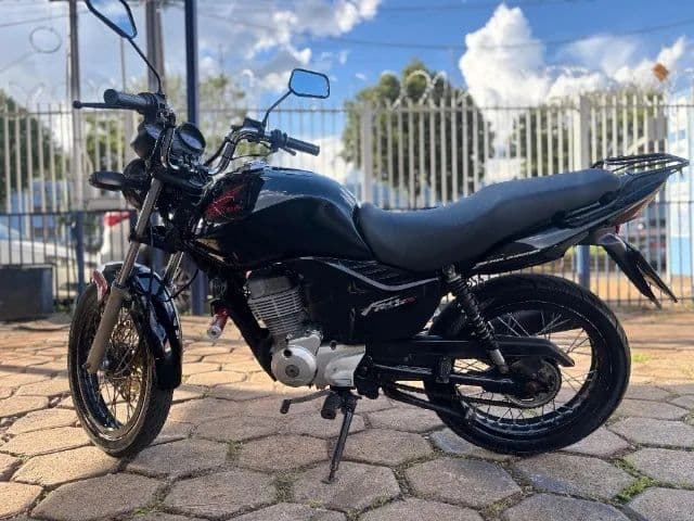 Moto top com partida elétrica e  freios   a disco 