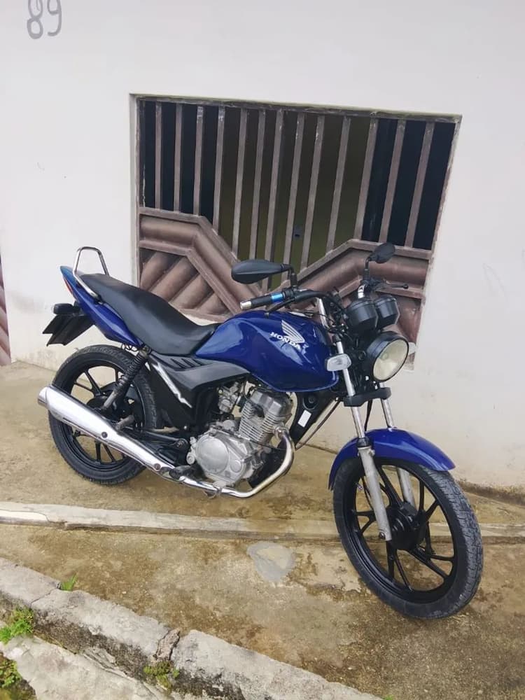 VENDO CG FAN  125  2010 COM PARTDA