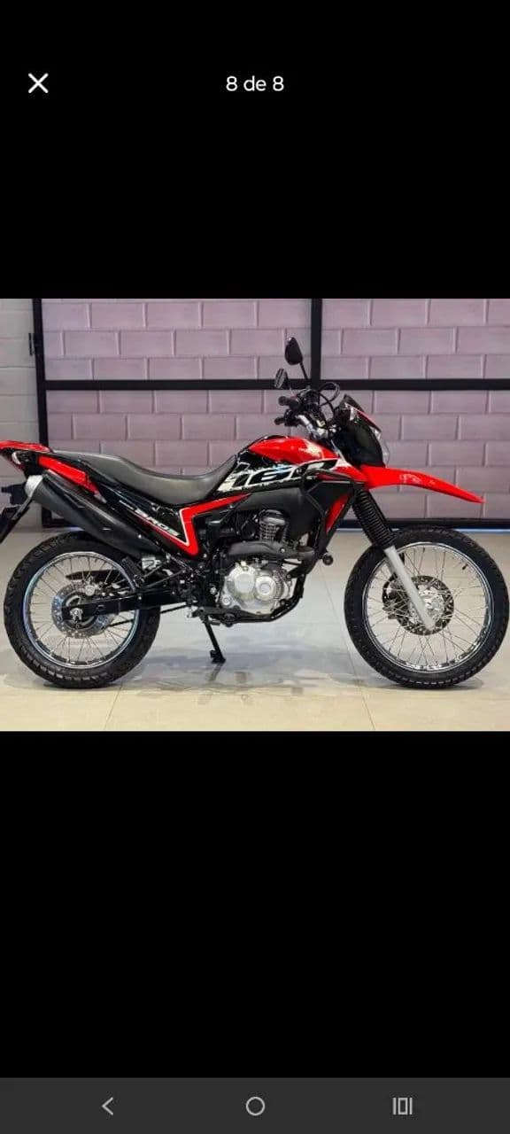 Moto particular! Muito bem conservada e com pouca km