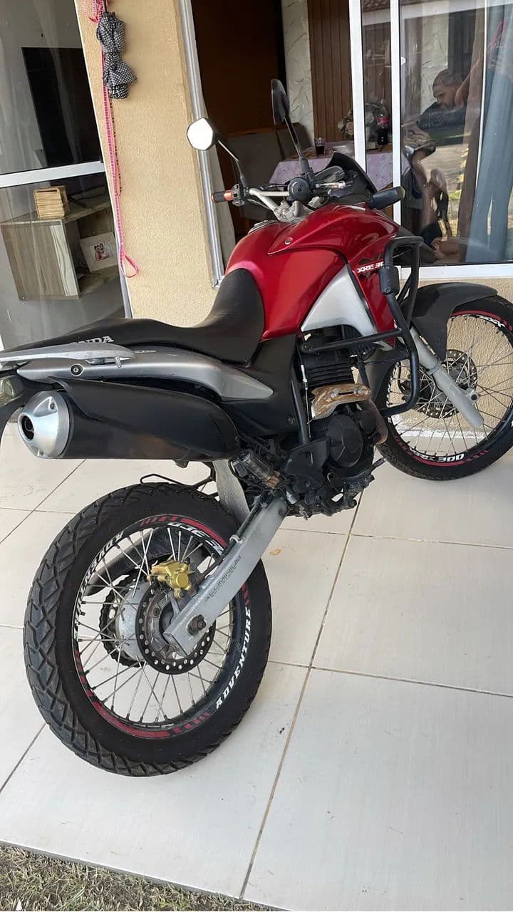 XRE 300 PRA VENDER LOGO 